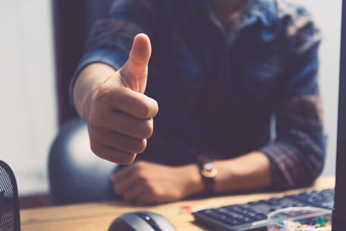 Businessman Showing Thumbs Up